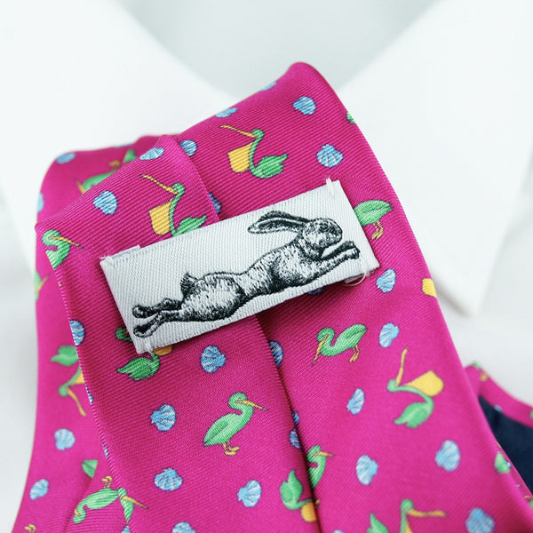 Cravate en soie tissée rose motifs coquillages et animaux